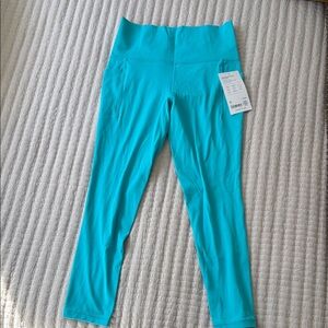 Athleta Salutation Stash 7/8 Tight